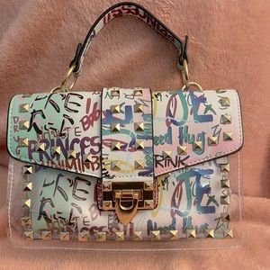 Graffiti and clear studded handbag